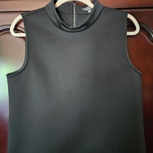 Vince Camuto sleeveless, mock neck crop top.